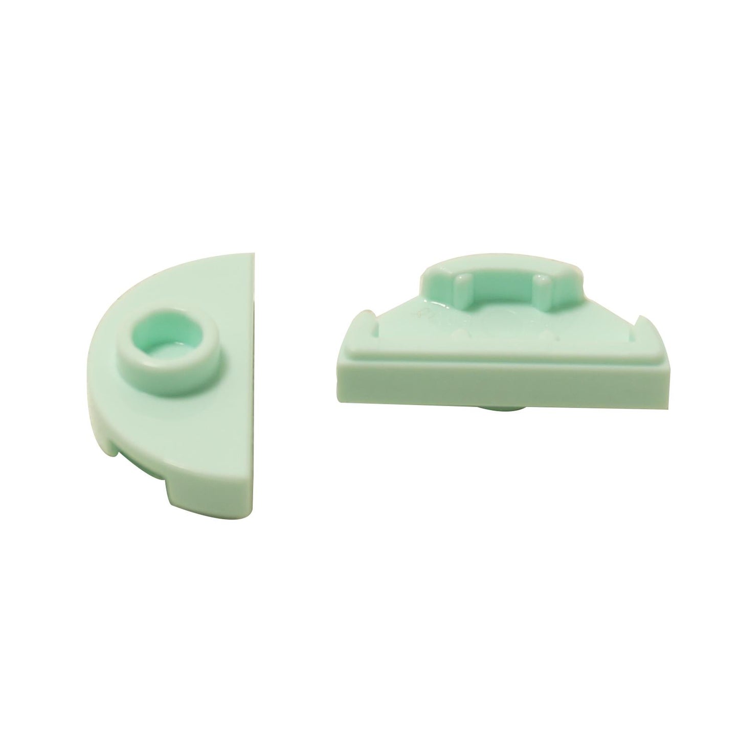 Two light aqua LEGO Plate 1x2 Half with 1 Stud (Jumper) pieces (1745) shown front and side.