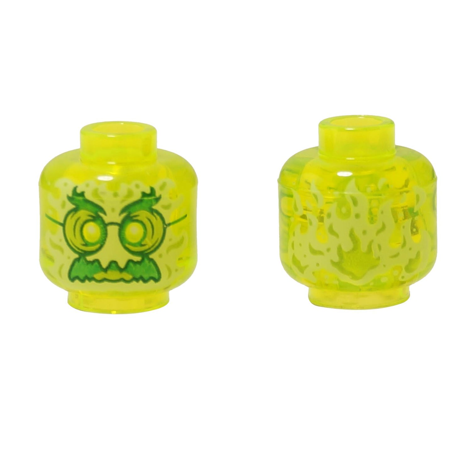 Front and alternate side views of the LEGO® minifigure head (3626pb2493) in transparent bright yellow, featuring a ghostly face with green glasses, bushy eyebrows, a mustache, and flame patterns wrapping around the sides.