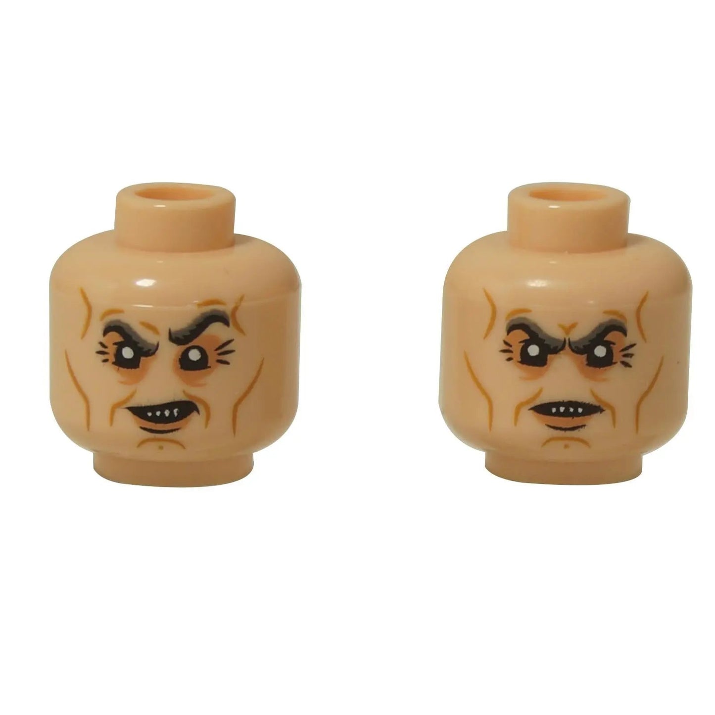 Dvoubarevná světlá nugátová LEGO® hlava (3626pb2871) s monstrózním úšklebkem na jedné straně a hrozivým, ostrým úsměvem na druhé straně.