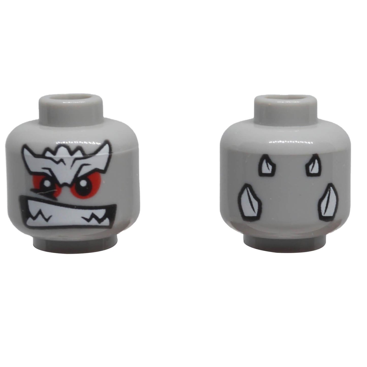 Front and back of LEGO® alien minifigure head 3626pb1832 with red eyes and rocky markings