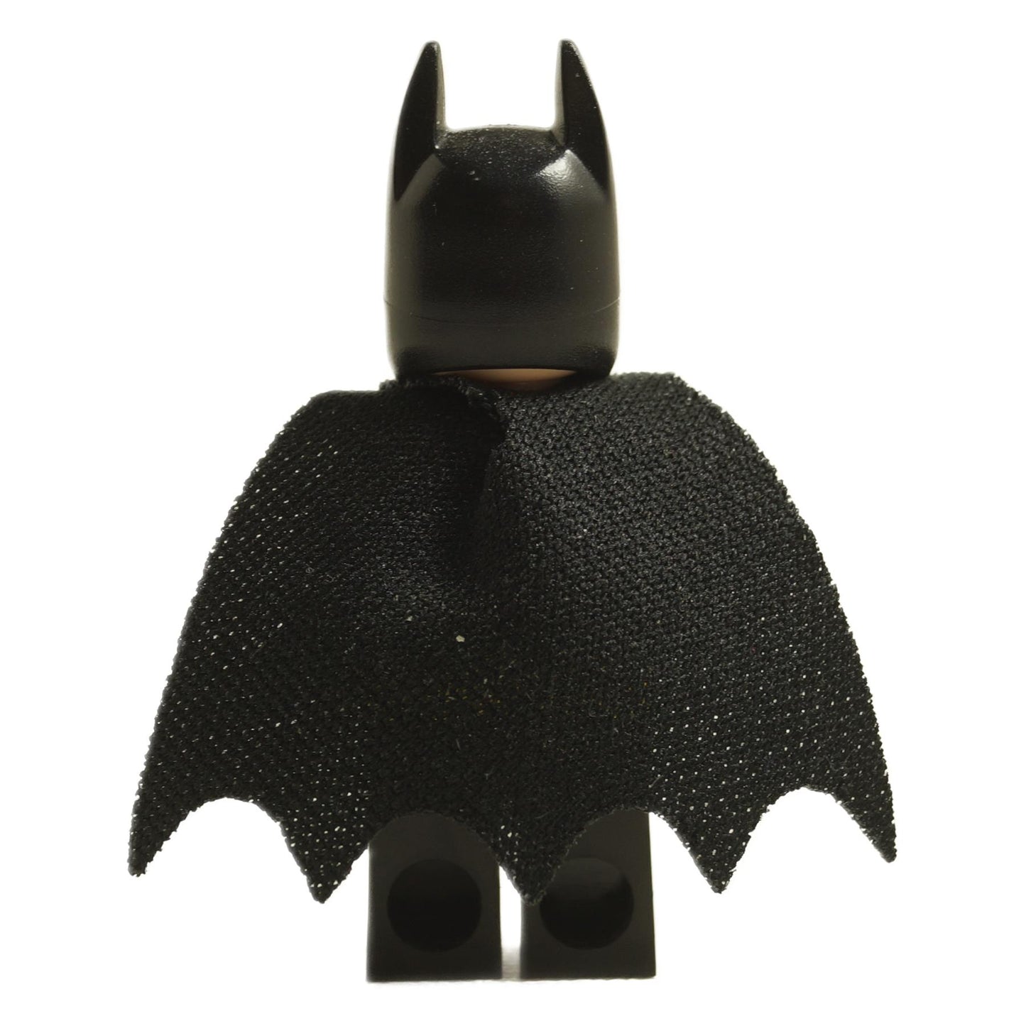 Rear view of LEGO Batman minifigure showing black cape and cowl