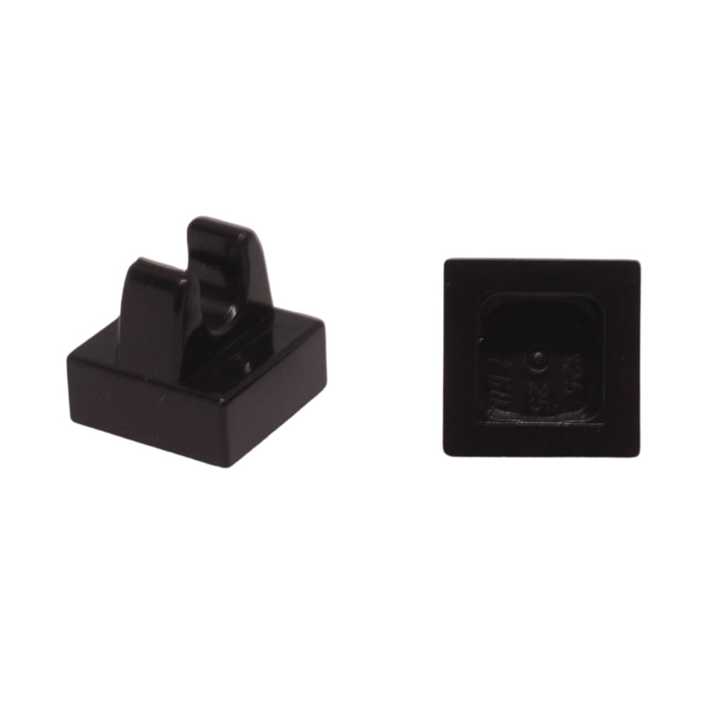 Black modified 1x1 tile with clip attachment, small connector piece for holding accessories and details