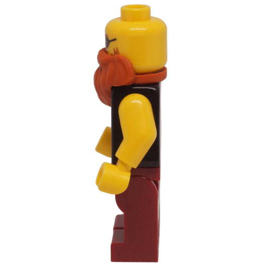 LEGO blacksmith minifigure with orange beard eyepatch and dark red workwear side profile view