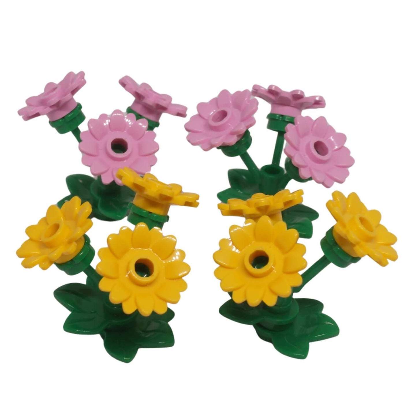 LEGO® bright pink and yellow flower garden display build with green stems and leaves