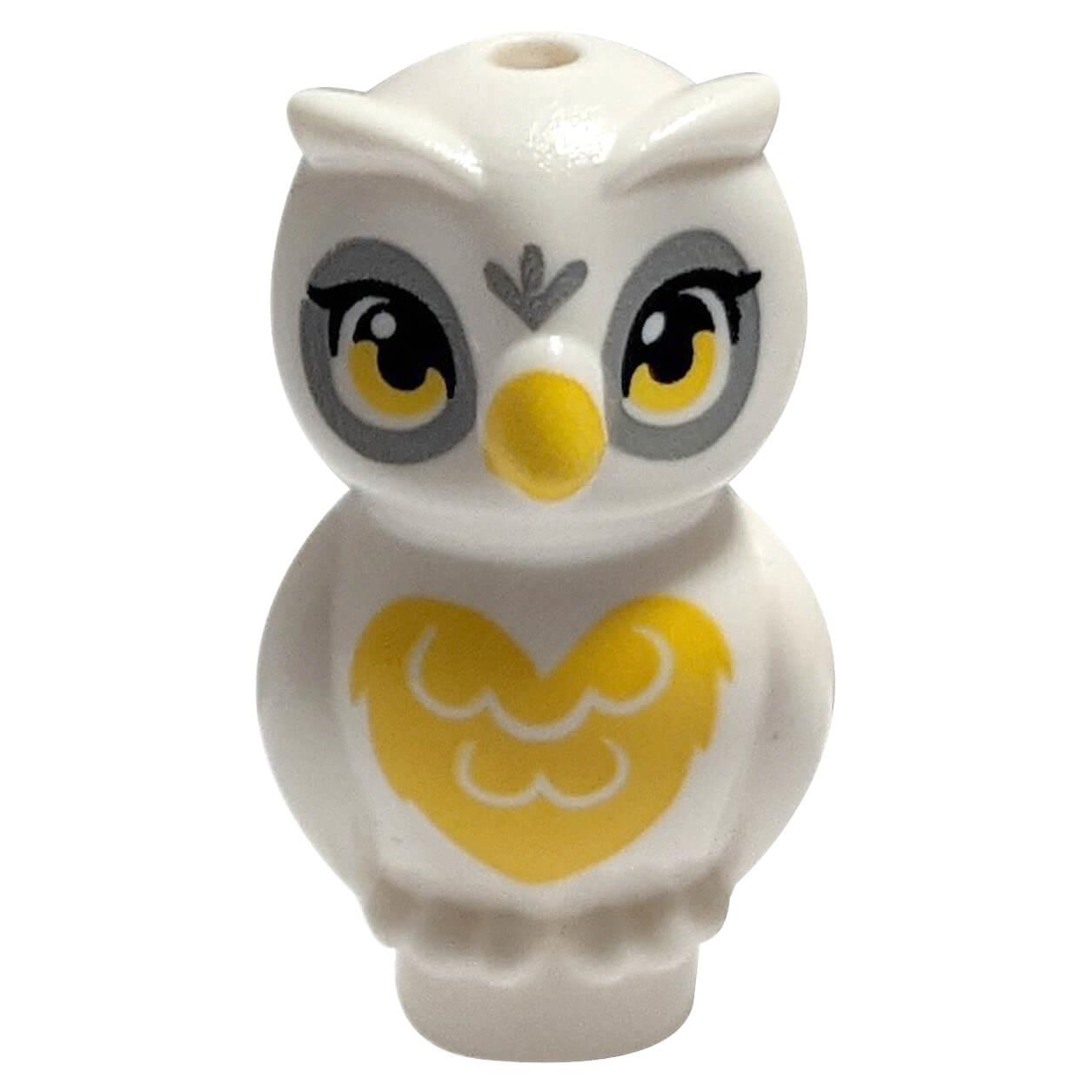Front view of the LEGO® stylized owl figure (21333pb05) featuring a white body, yellow beak, grey eye markings, and a yellow heart-shaped chest pattern.