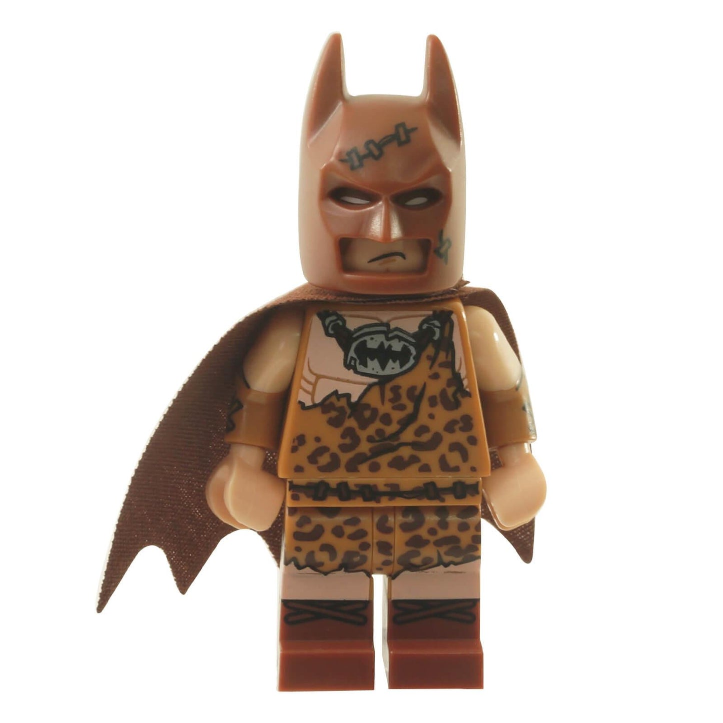 A LEGO minifigure of Clan of the Cave Batman from The LEGO Batman Movie, featuring a rugged, animal-skin outfit with primitive details.