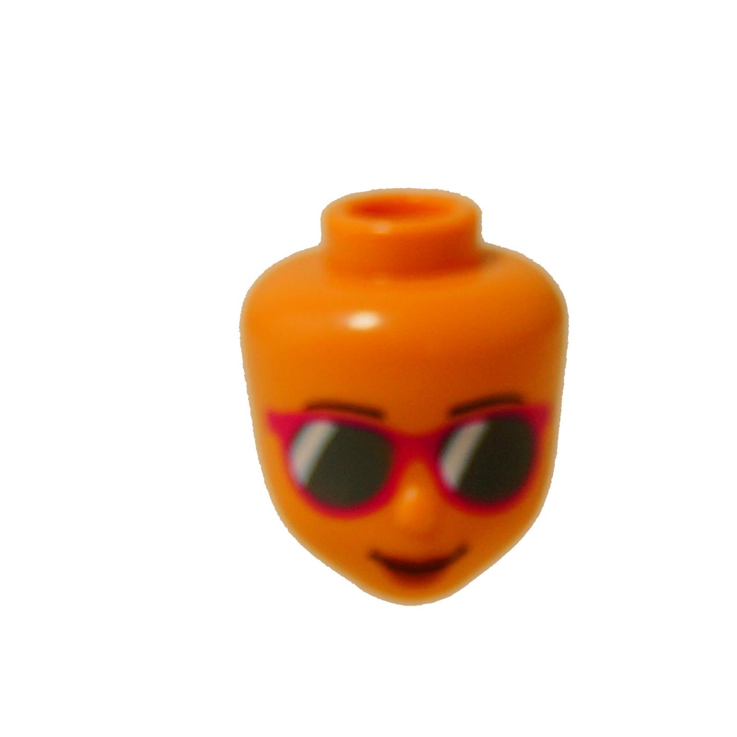 LEGO Friends mini-doll head (72409) with pink sunglasses and a smiling mouth.