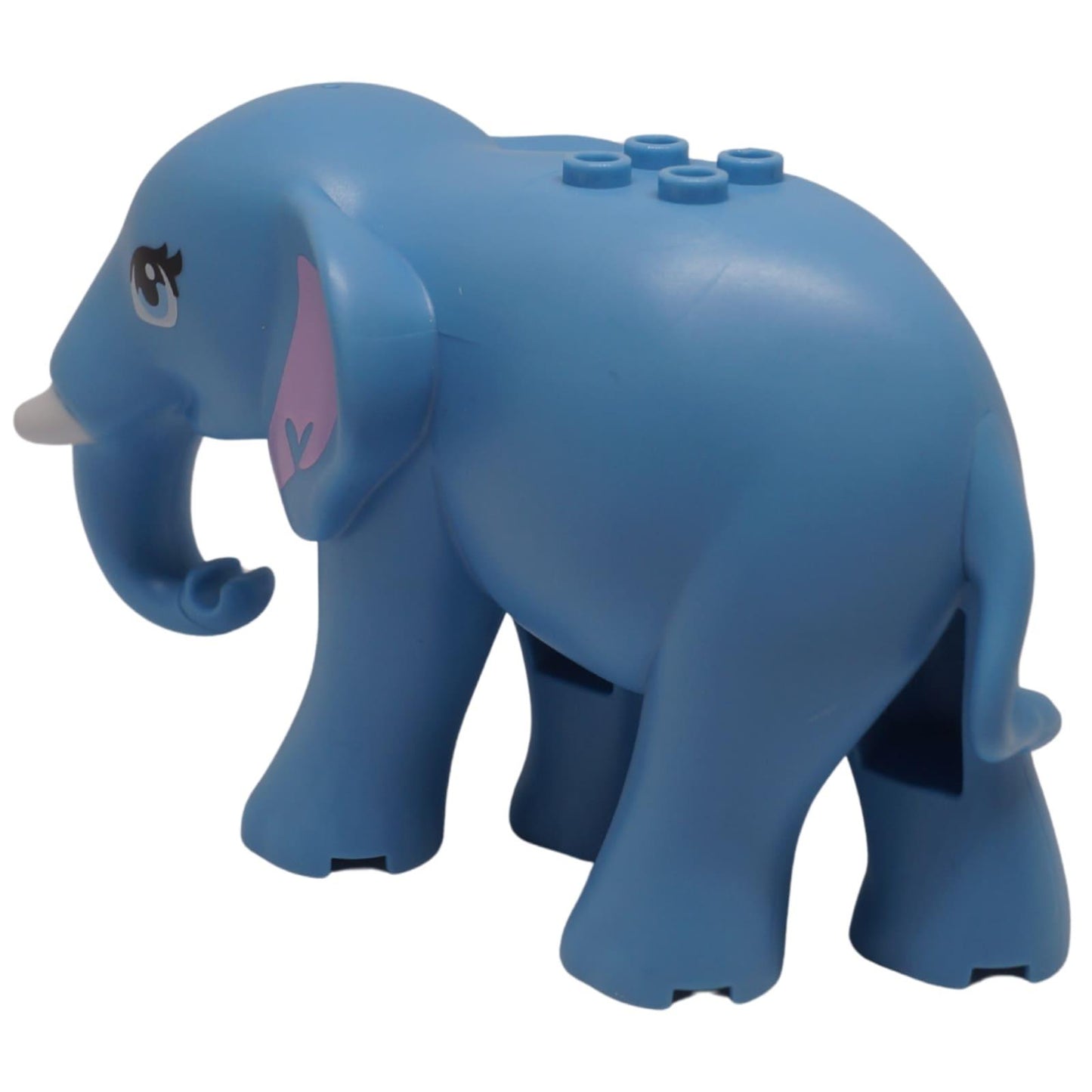 Figura de elefante azul de LEGO Friends con orejas internas de un rosa brillante, colmillos blancos y cuatro studs en su espalda para mini muñecas, vista trasera.