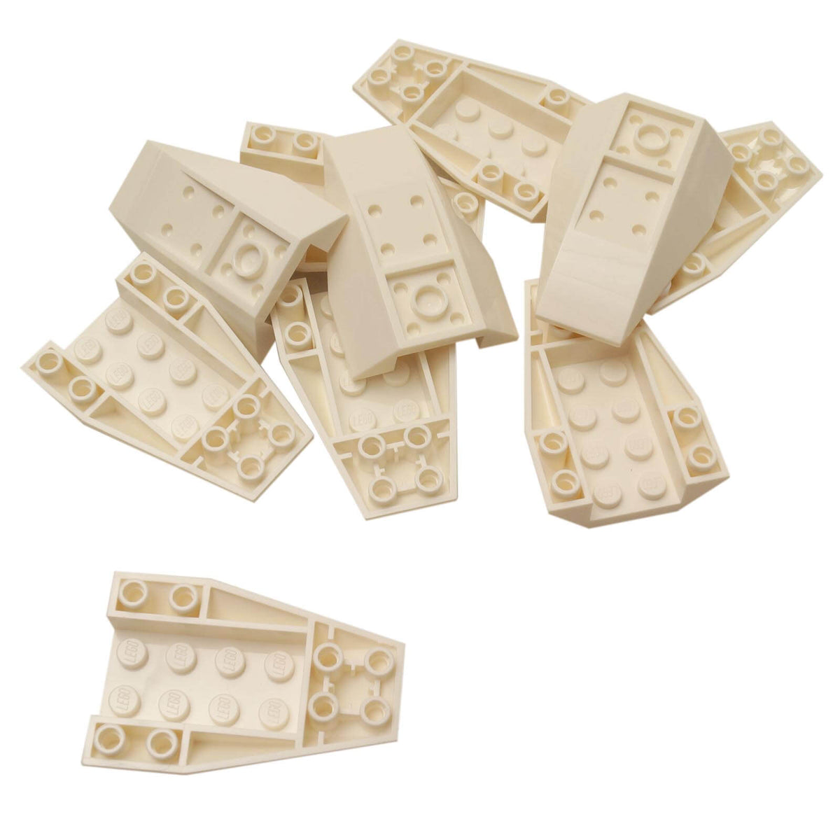 White LEGO® Part 43713 Wedge 6 x 4 Triple Inverted Curved, showing its curved wedge profile and underside connection details