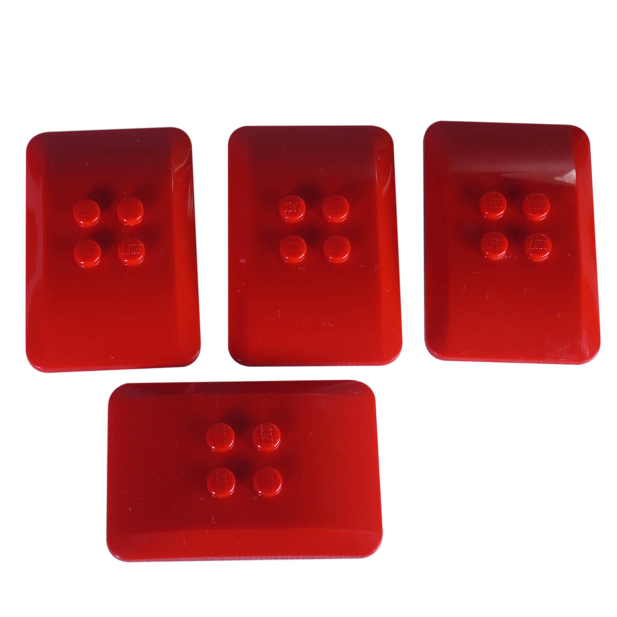 Red LEGO® Part 98281 Wedge 6 x 4 x 2/3 Quad Curved with smooth rounded edges, low-profile shape and four visible studs
