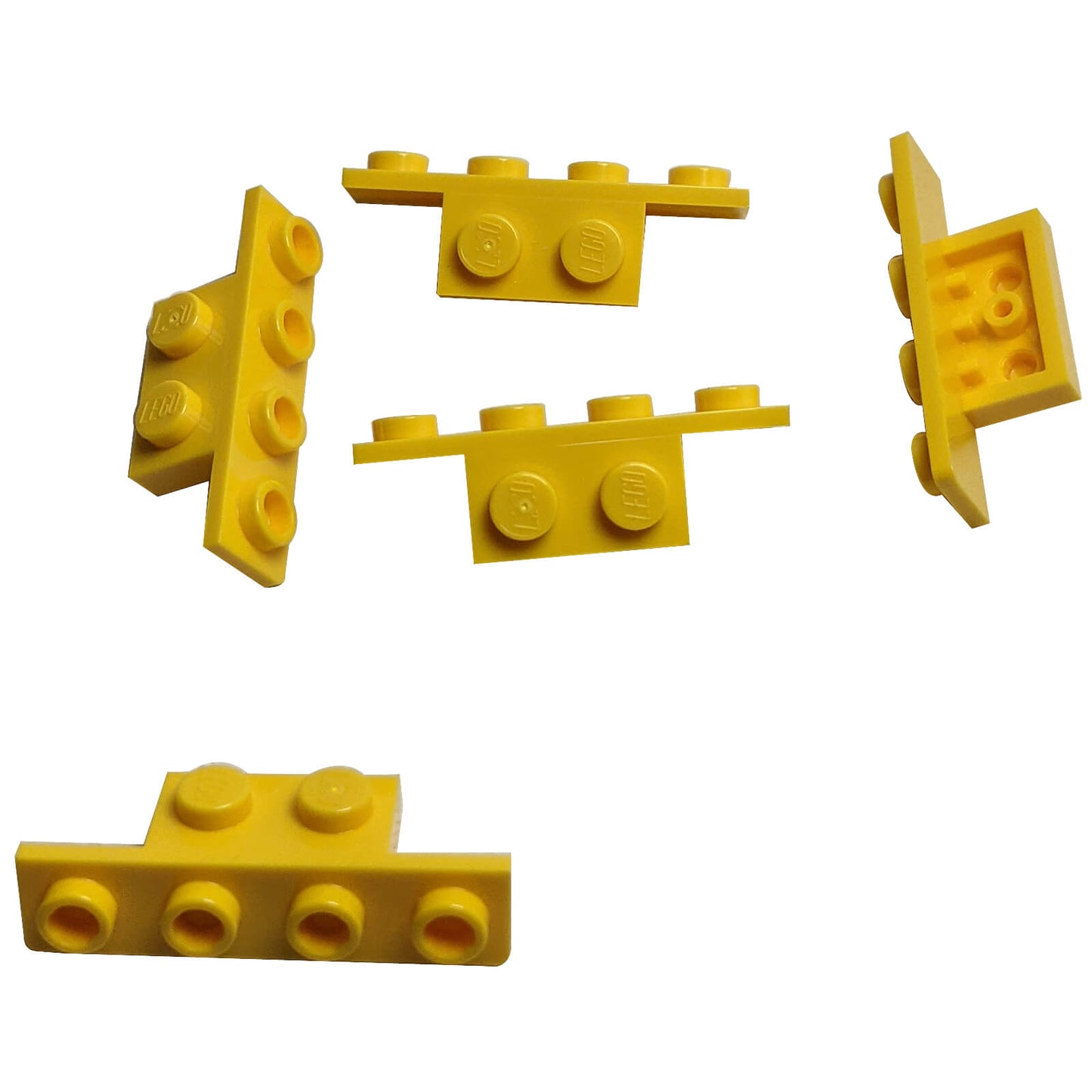 LEGO® Bracket 1 x 2 – 1 x 4 (Part 28802) in yellow, used for offset building and SNOT constructions