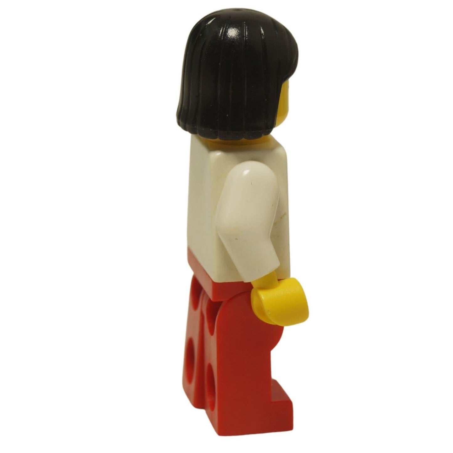 LEGO® Classic Airport female worker minifigure (air011) with the iconic striped airplane logo shirt and black hair. Side view.