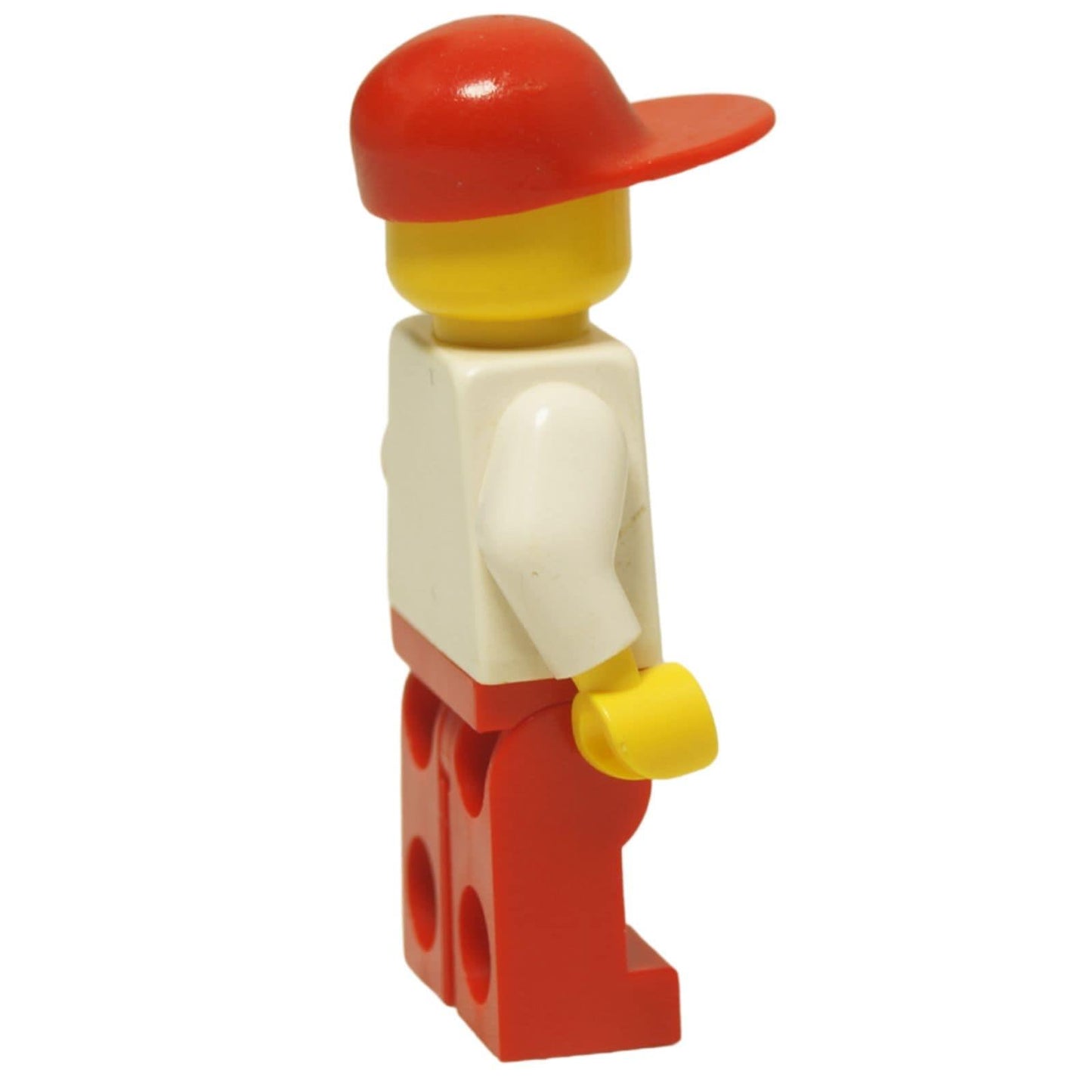 LEGO® Classic Airport worker minifigure (air004) with the iconic striped airplane logo shirt, red legs, and a red cap. Side view.