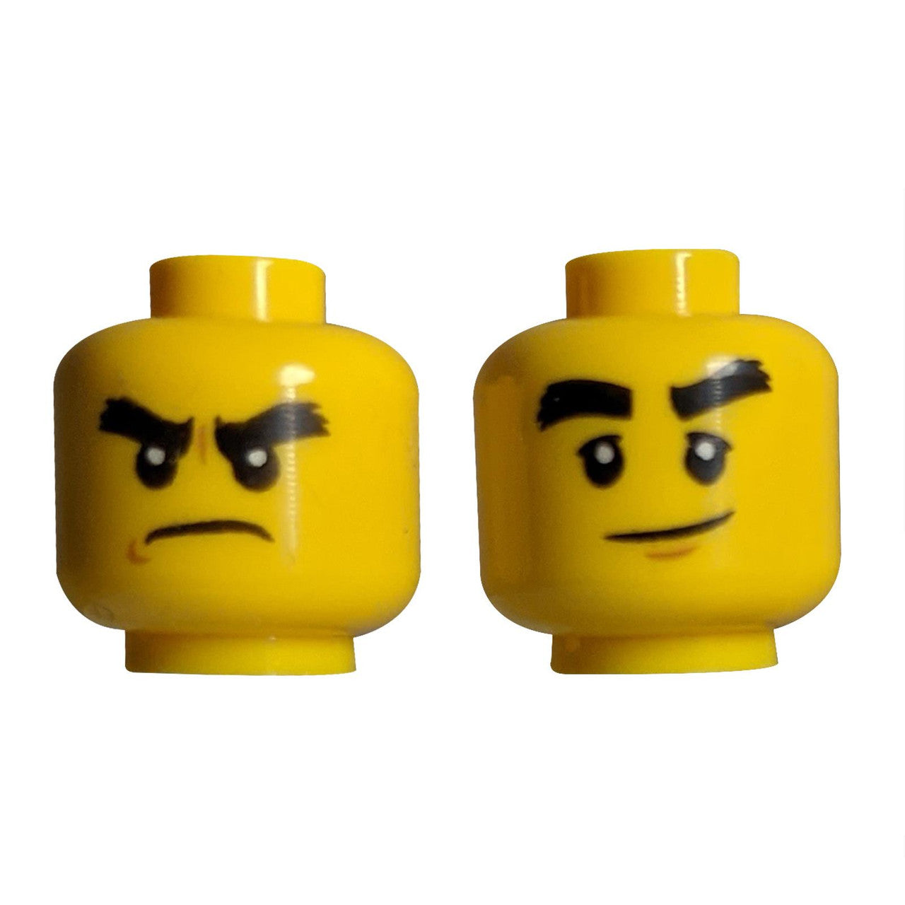 LEGO® dual-sided minifigure head (3626pb1893), showing both the smirking and angry expressions.