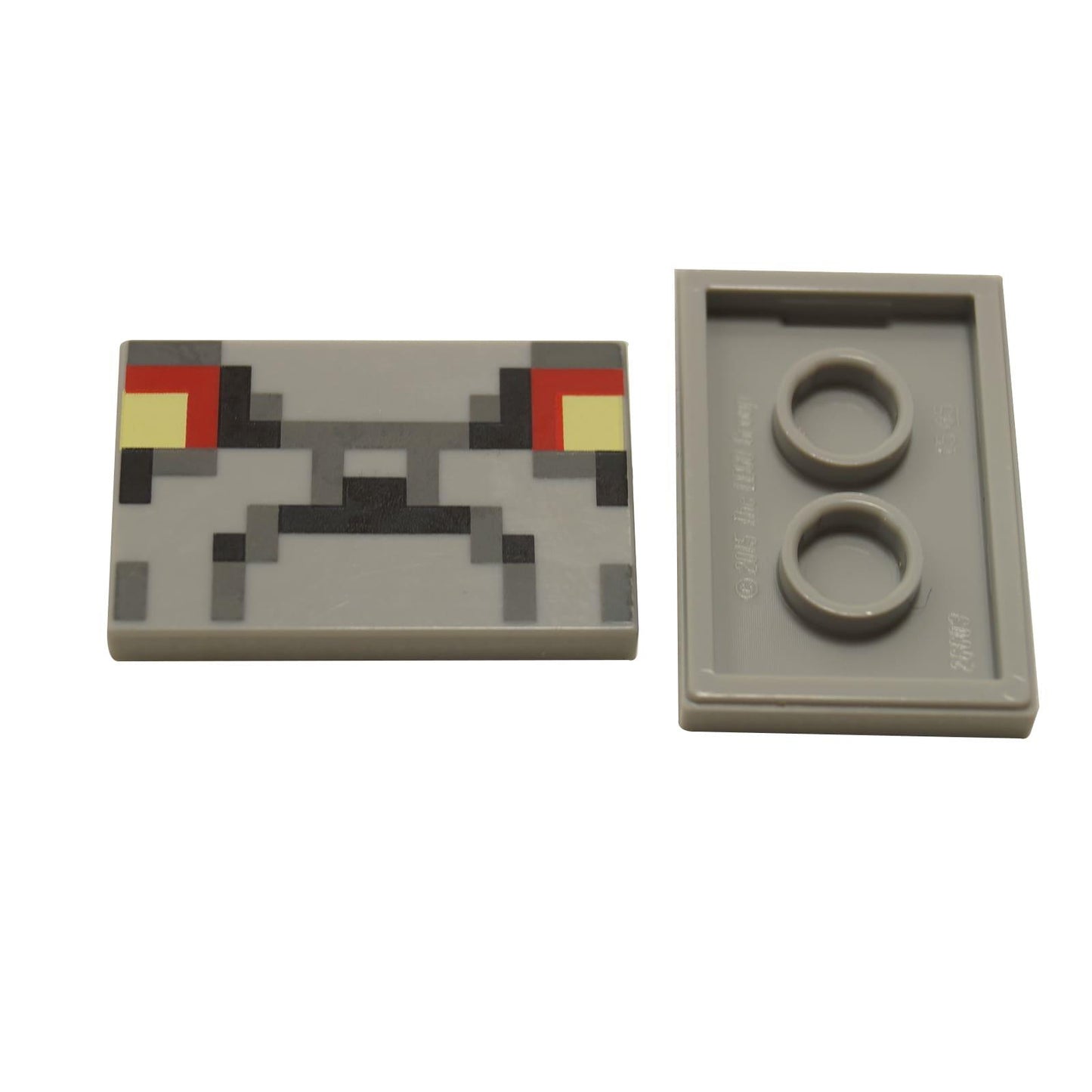 Azulejo de cara de Golem de Redstone LEGO Minecraft 26603pb089 gris con ojos amarillos pixelados vista frontal