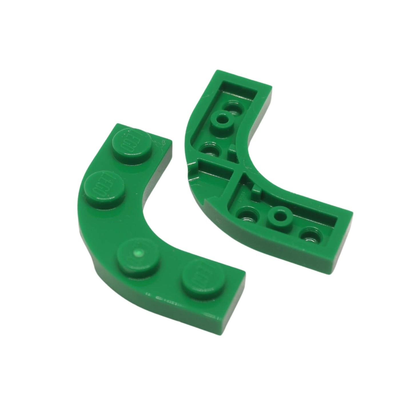 LEGO® Plate, Round Corner 3 x 3 with 2 x 2 Curved Cutout in green, used for rounded edges and smooth transitions in builds