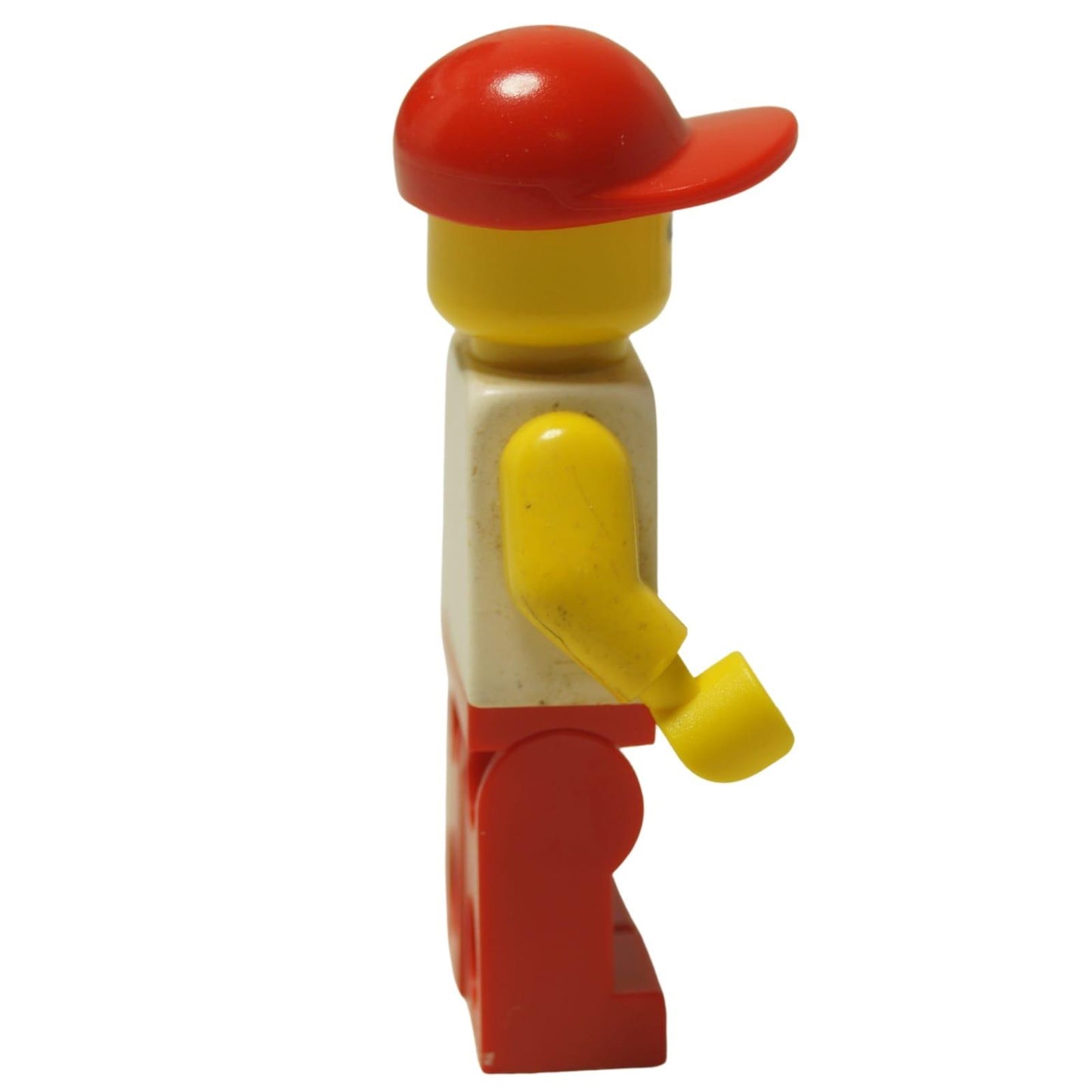 LEGO Classic Town Trucker minifigure trc001 with red truck torso print and red cap. Side profile view.