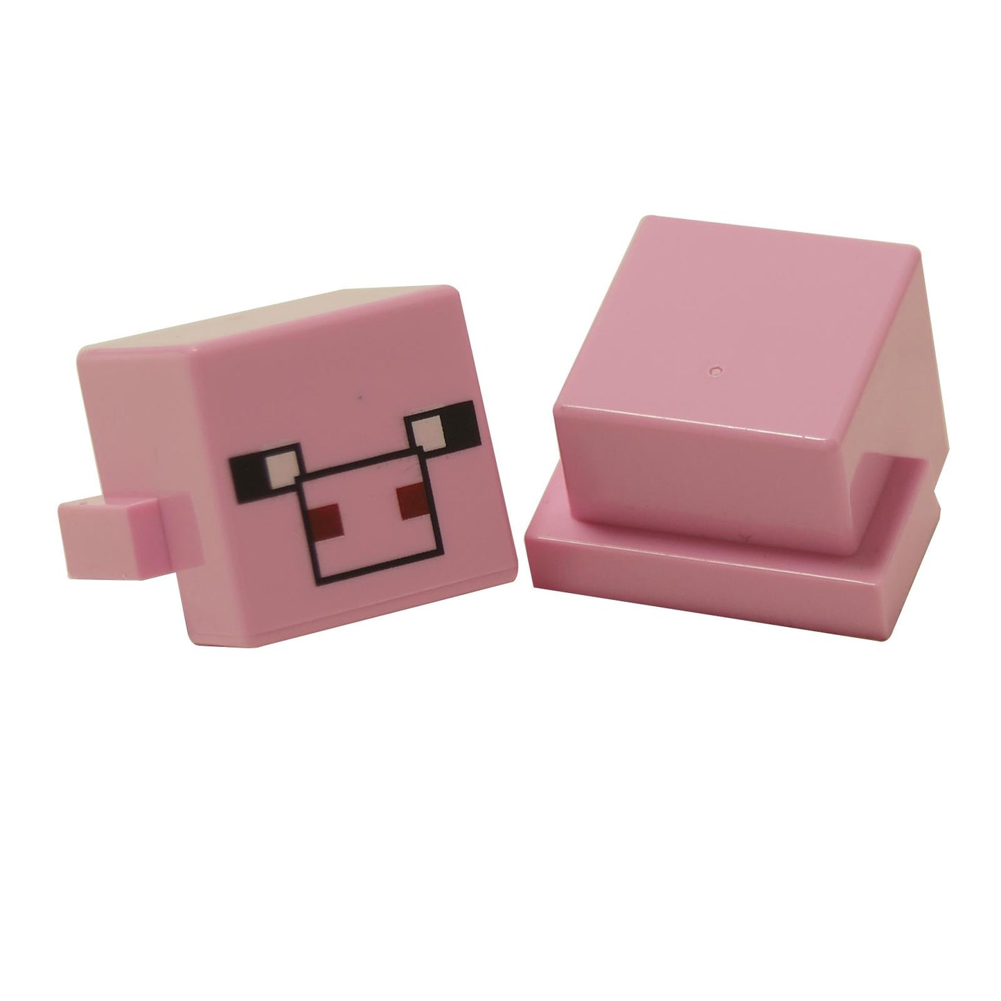 Minecraft pig cube head with pink pixel face, square snout and black eyes