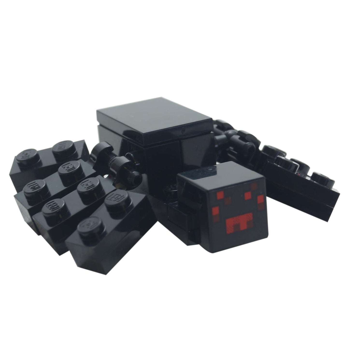 Black LEGO Minecraft Spider buildable figure with red eyes and smooth tile back.