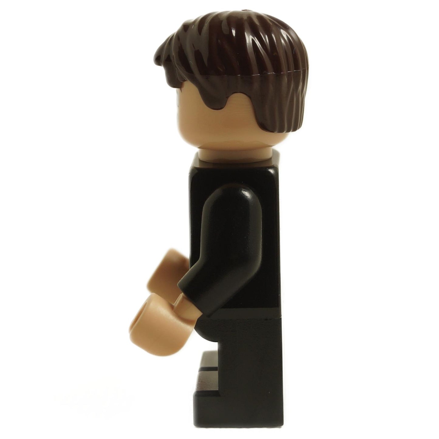 Side view of LEGO Neville Longbottom minifigure wearing Hogwarts robe with black tie