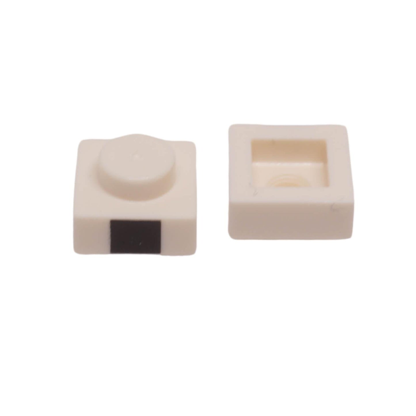 LEGO Plate 1 x 1 featuring a small black square pattern printed on the side edge (Part 3024pb010).
