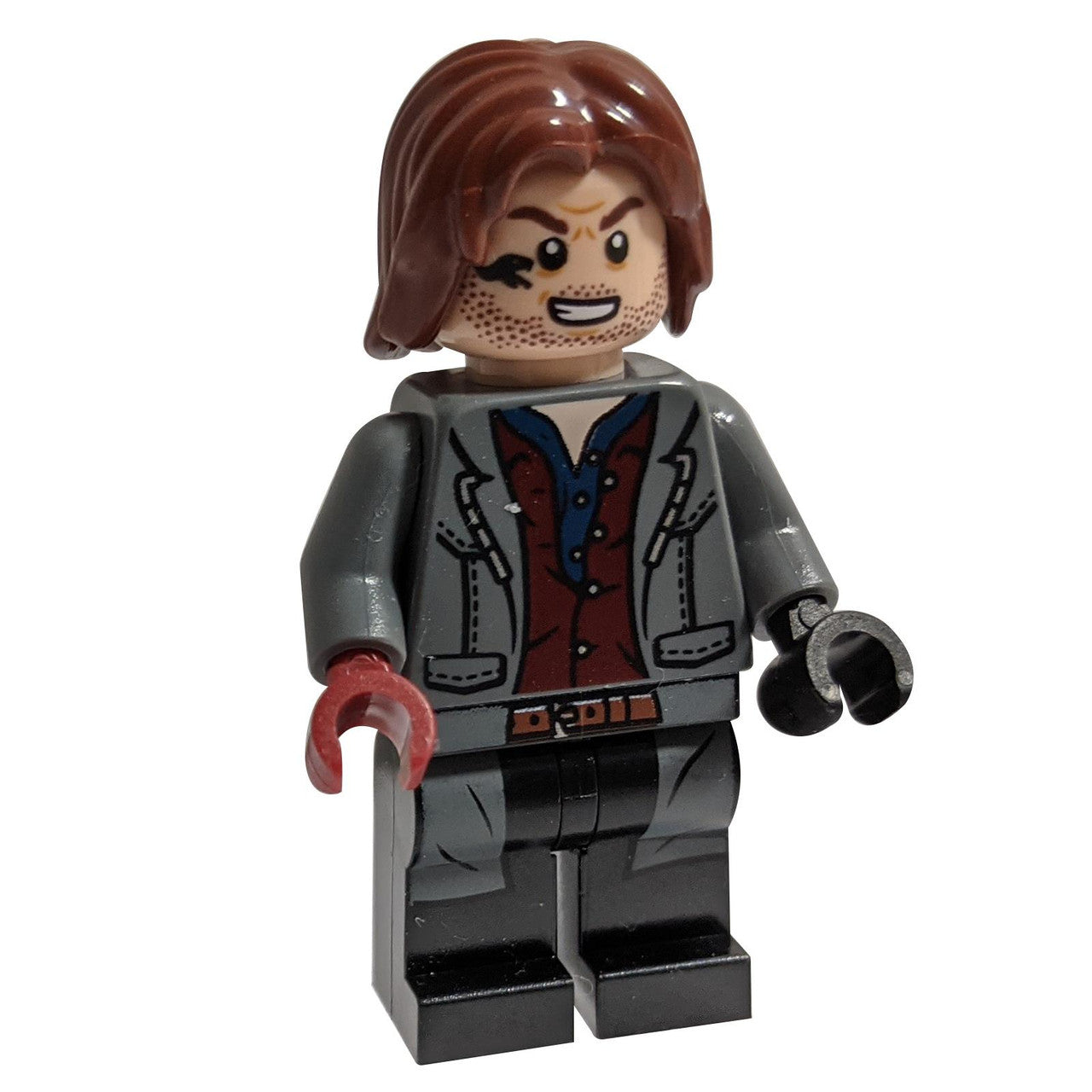 Minifigura Rainn Delacourt din LEGO Jurassic World, prezentată din față. Are un aspect dur, cu barbă de câteva zile, o jachetă gri și o mână de culoare roșie închisă.