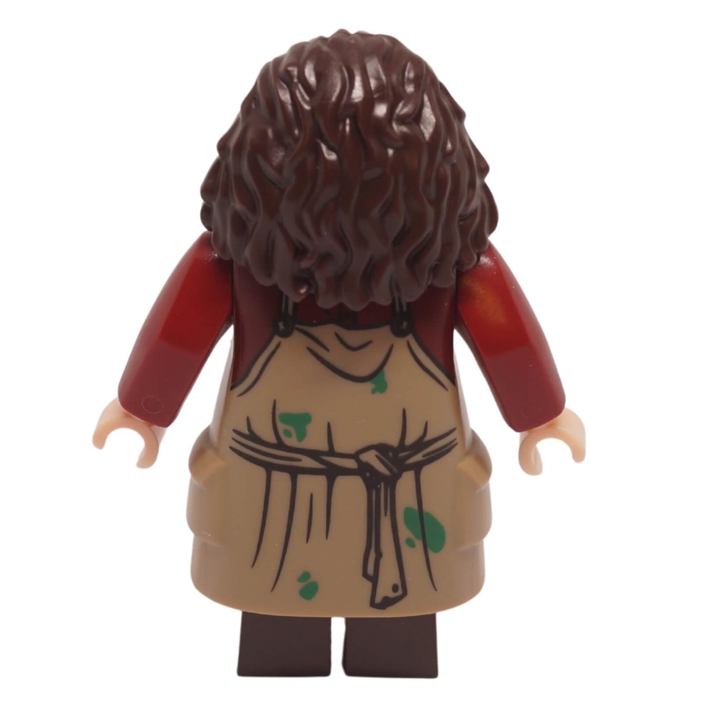 Vista posterior de la minifigura de Rubeus Hagrid con cabello largo y castaño y delantal color canela oscuro con manchas de pintura.