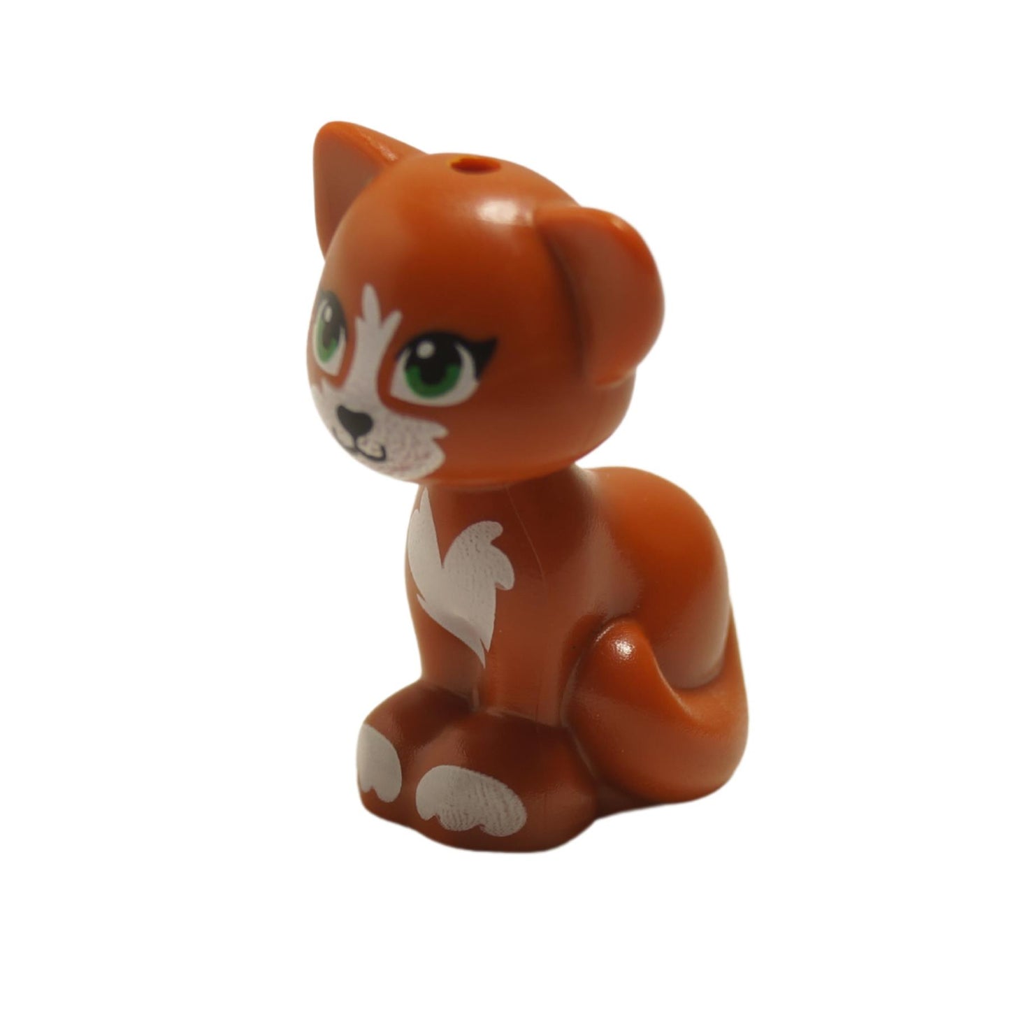 Angled view of sitting cat figure with green eyes, white chest marking and curled tail, part 11602pb11