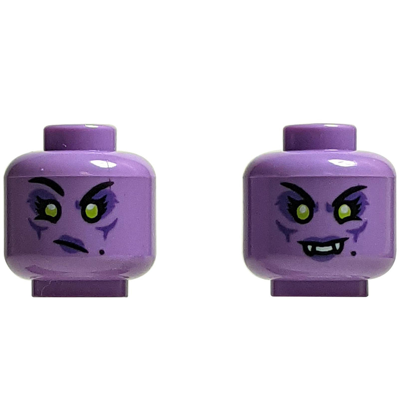 Dual-sided purple LEGO vampire head 3626pb3497 with fangs and green eyes.