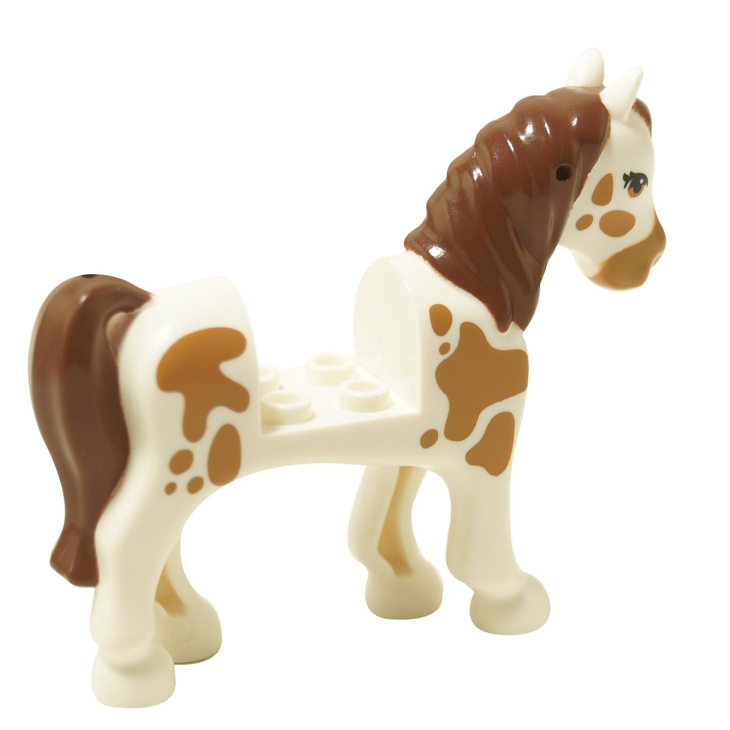 White horse figure back view with brown spots and reddish brown mane tail