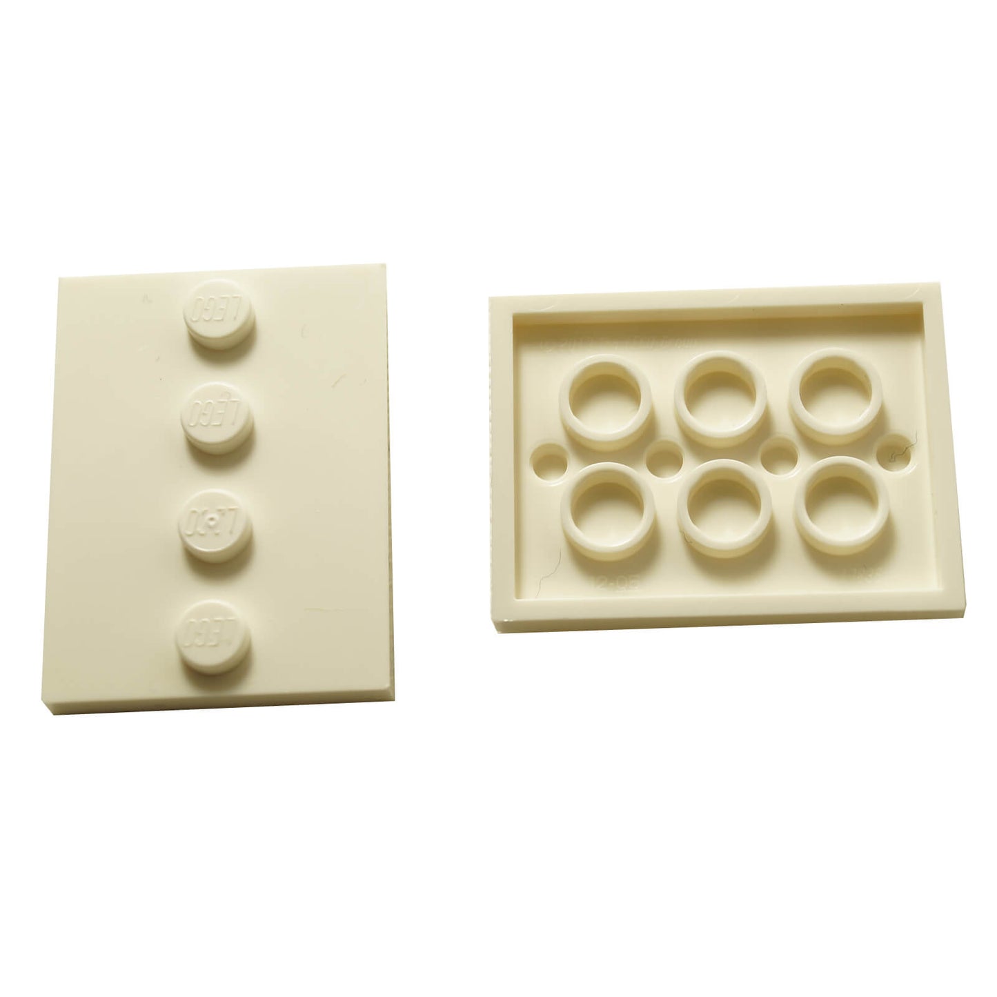 White LEGO® modified 3 x 4 tile with four centered studs, ideal for decorative builds and detailing