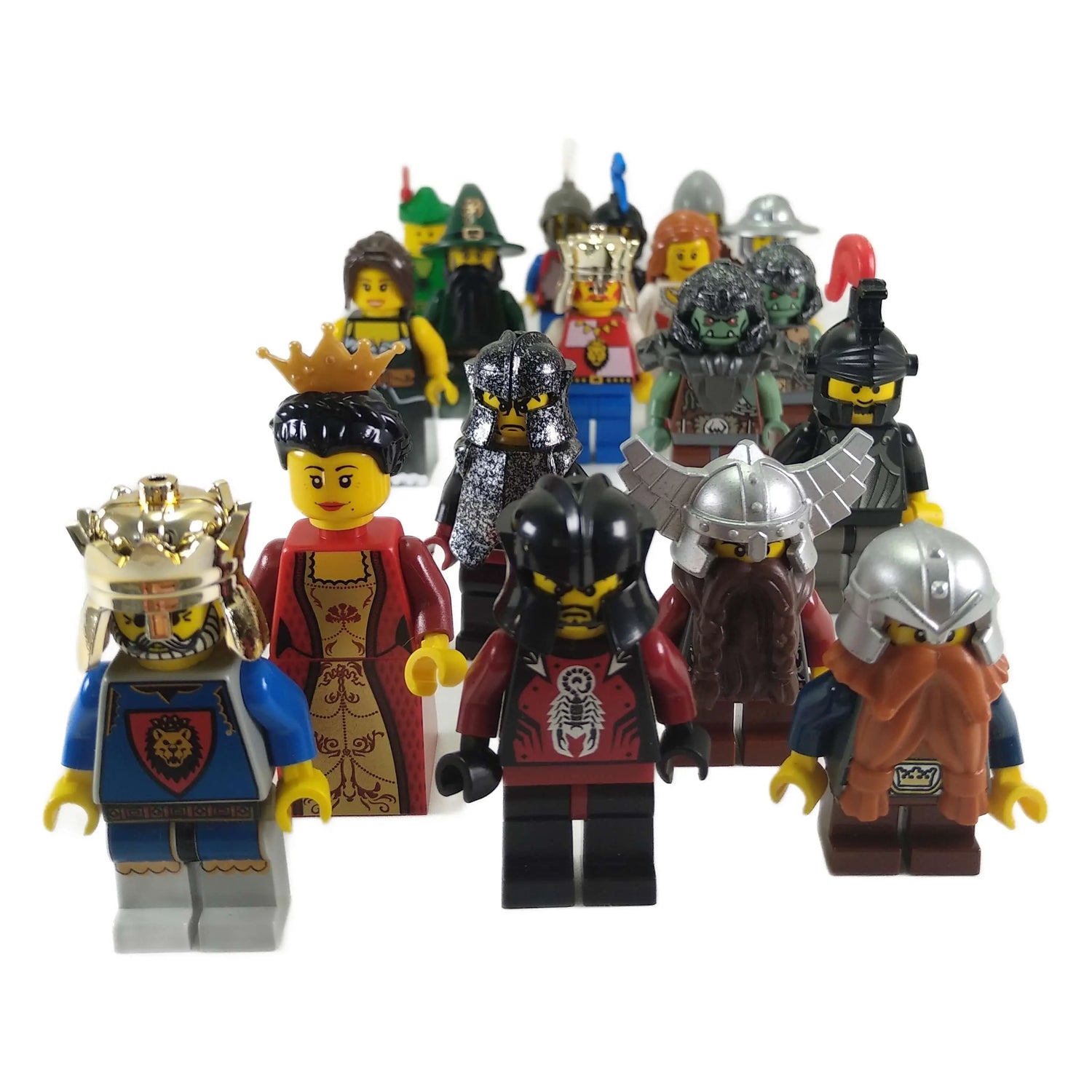 Group of LEGO® Castle minifigures including kings, queens, knights, dwarves, elves, and orcs on white background