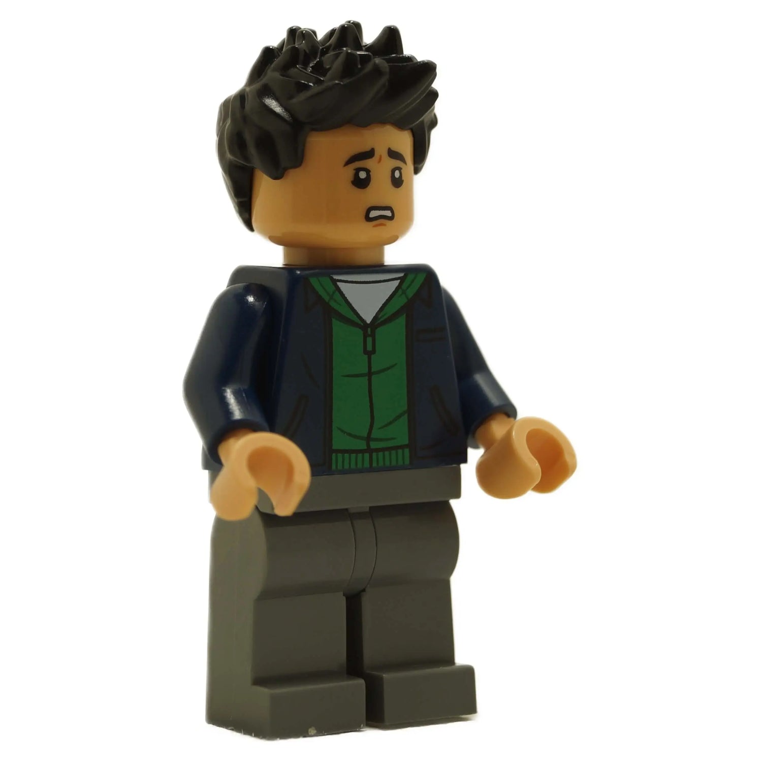LEGO® Kenji Kon Minifigure from Jurassic World Chaos Theory with Dark Blue Jacket, Green Hoodie, and a worried expression. Perfect for recreating Camp Cretaceous adventures and thrilling dinosaur escapes.