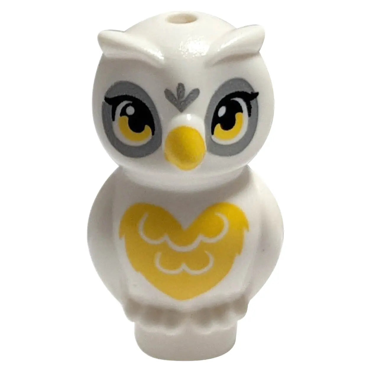 LEGO® white owl with yellow beak, yellow chest heart pattern, and expressive printed eyes – stylized animal figure from LEGO® Friends or Elves