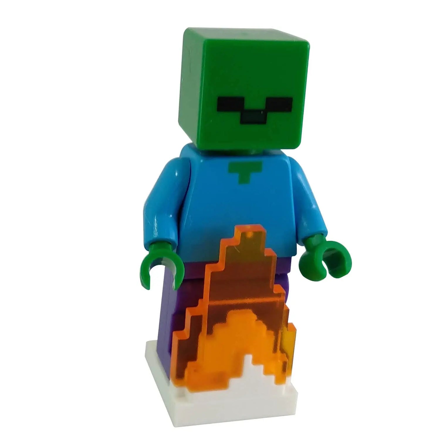 LEGO Minecraft Zombie minifigure with green head and blue torso standing in pixelated orange flames.