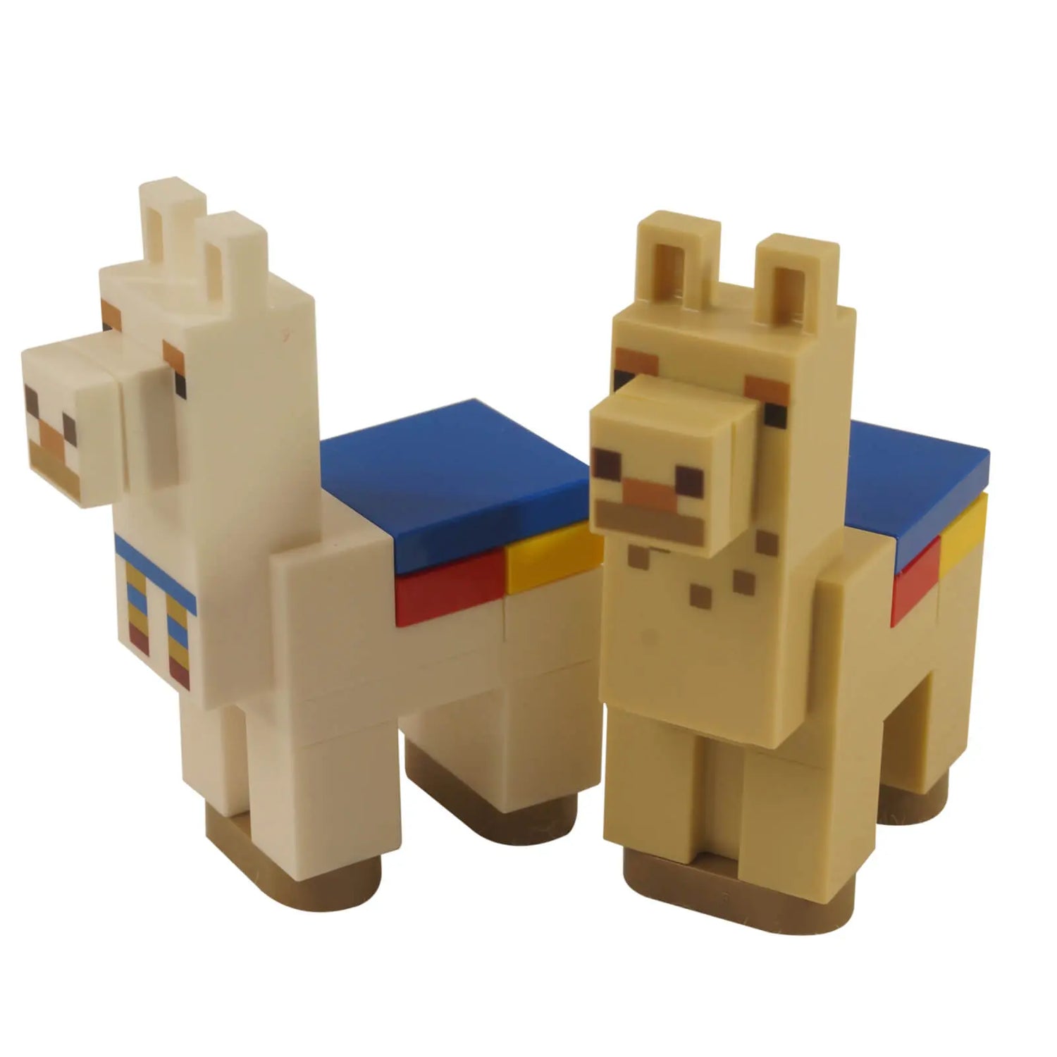 Two LEGO® Minecraft Llama Minifigures, one white with a blue carpet and one tan with a colorful design, representing the Trader's Llama and Decorated Llama from Minecraft.