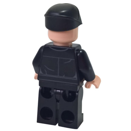 LEGO® Star Wars™ Imperial Shuttle Pilot minifigure (sw0802) rear view, showing plain black back printing and black cap. Displayed on a white background.  