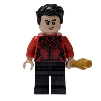 Shang-Chi con arma
