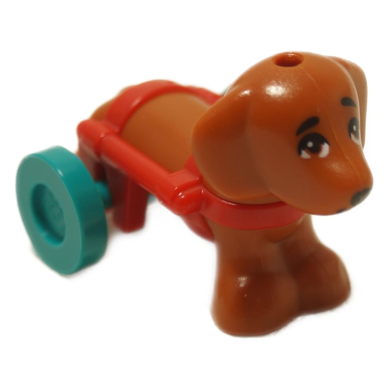 Dachshund dog figure with red wheelchair and turquoise wheels
