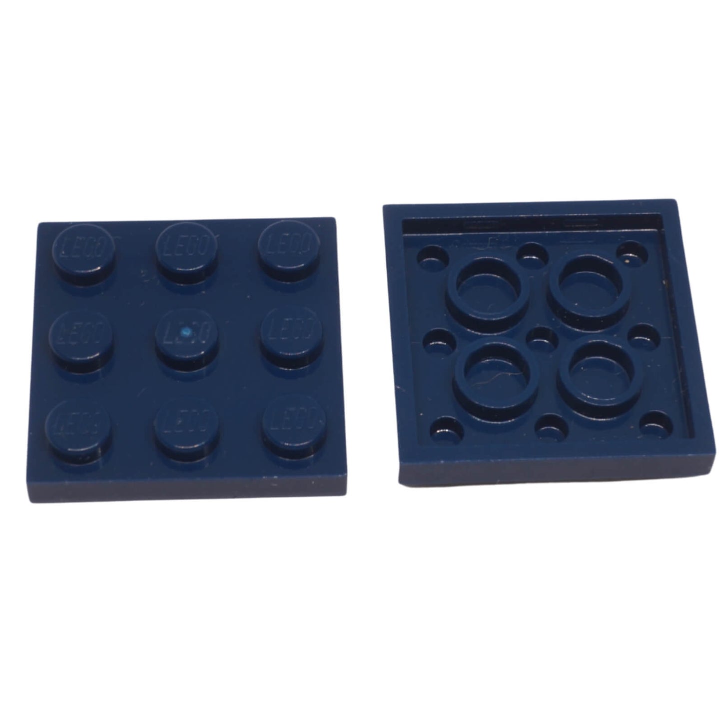 Dark blue LEGO Plate 3 x 3 part 11212 with nine top studs and underside tube structure