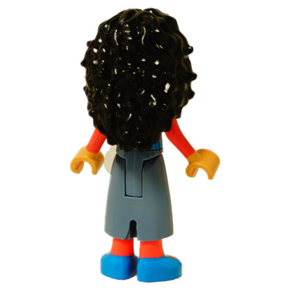 Rear view of the LEGO® Nessarose mini-doll (wck002) showing long dark curly hair and gray skirt with back detailing.