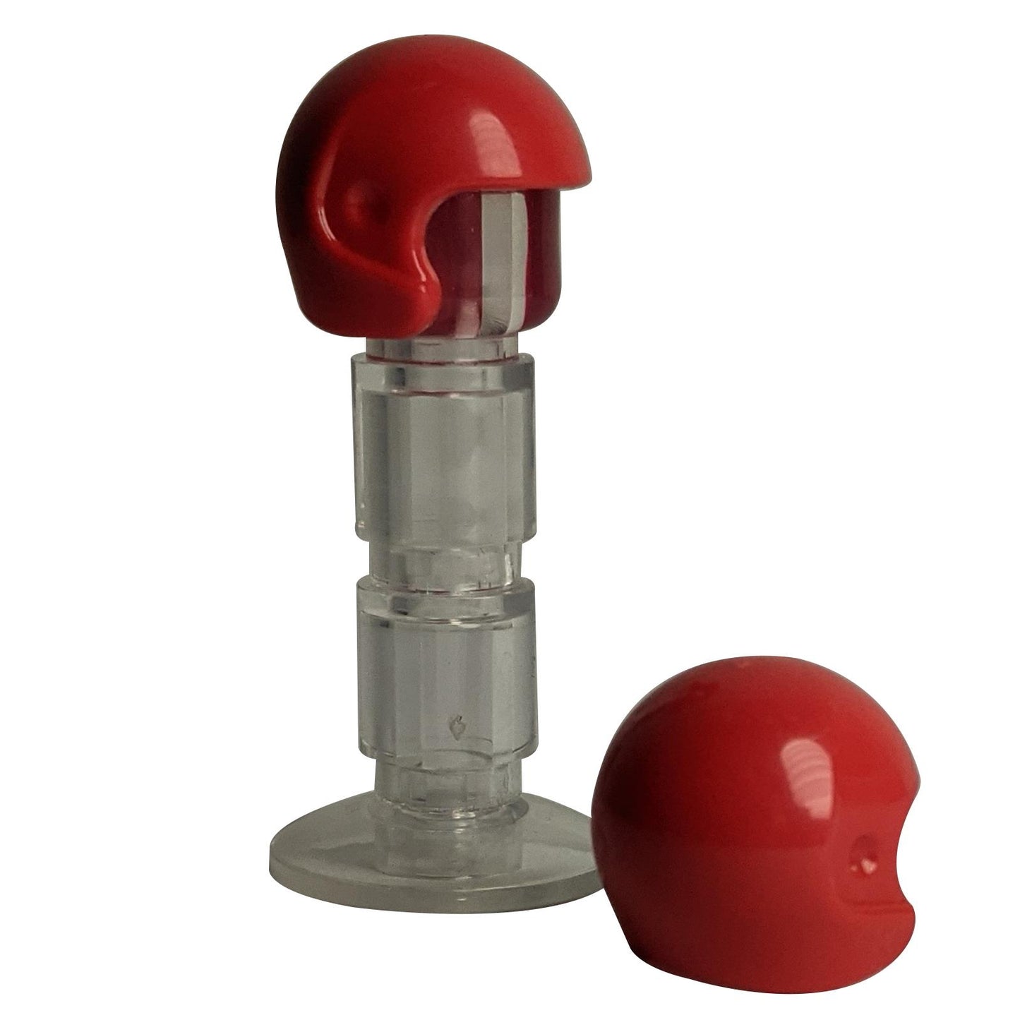 LEGO® Sports & Flight Helmet 93560 in red, displayed on transparent stand with spare helmet beside it.