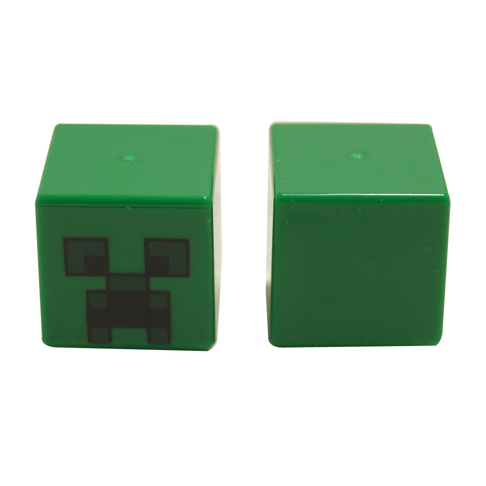 A green minifig head cube with a Minecraft Creeper face pattern on one side, displayed against a white background.