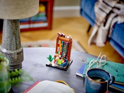 LEGO Books Are My Passion set on a desk with a minifigure reading.