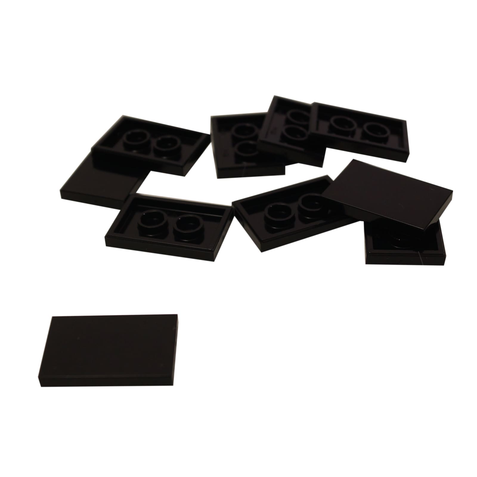 LEGO® Tile 2x3 in durable plastic, in black, perfect for smooth surfaces, flooring, and decorative MOC detailing.
