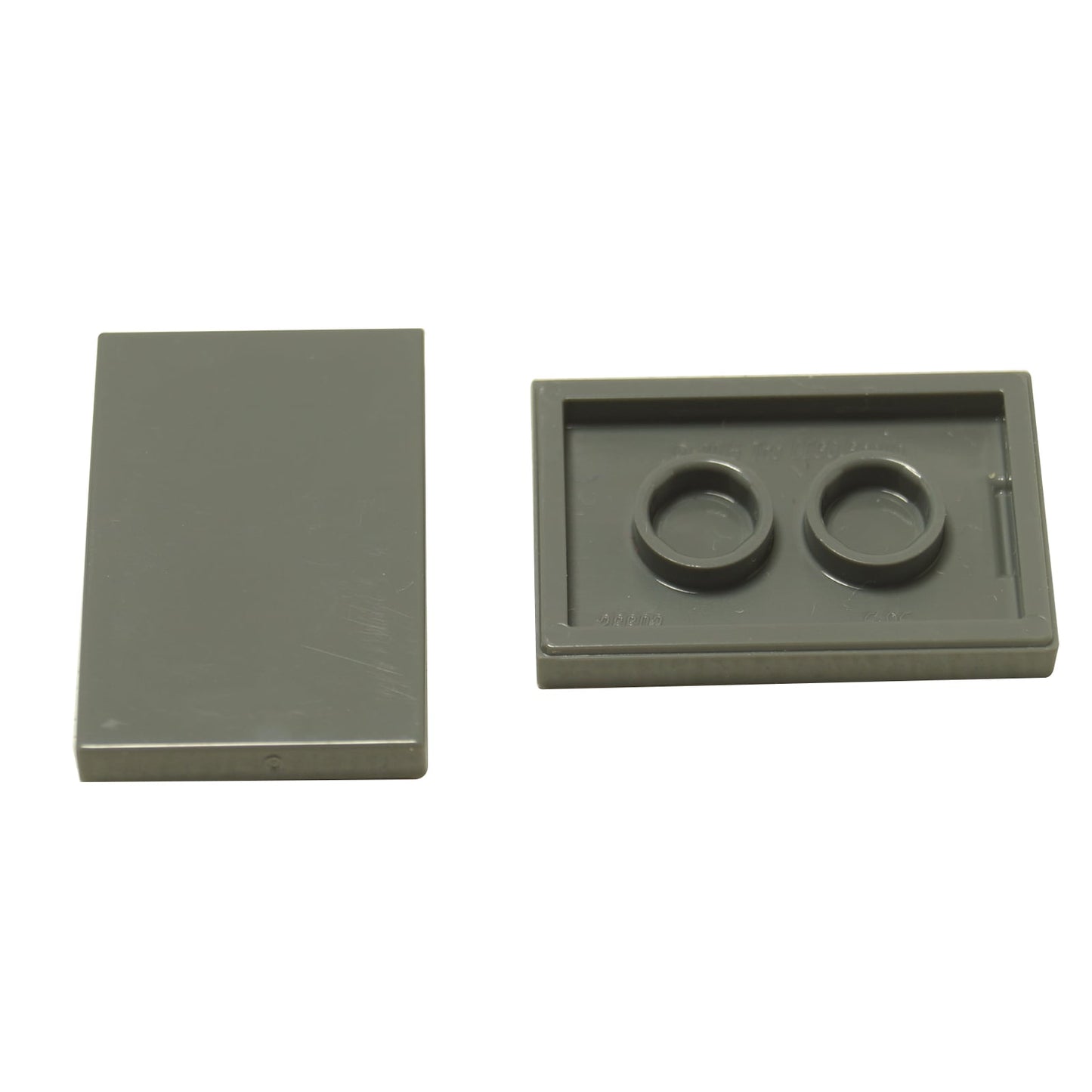 LEGO® Tile 2x3 in durable plastic, in dark bluish gray , perfect for smooth surfaces, flooring, and decorative MOC detailing.
