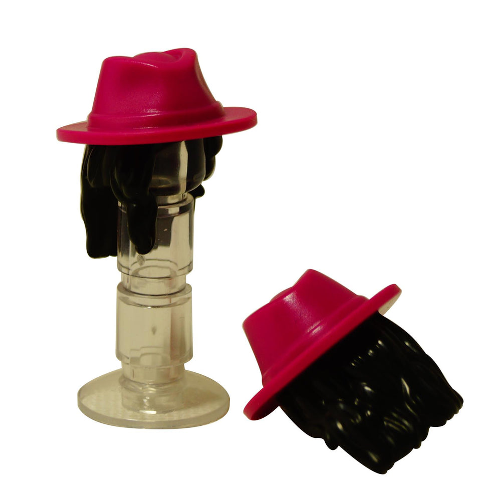 Two black LEGO minifigure hairpieces with sculpted waves, one topped with a bright pink fedora hat.