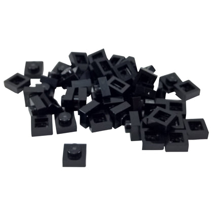 LEGO® Placa 1x1 en negro, un elemento básico versátil ideal para detalles, separación y conexiones precisas de MOC.
