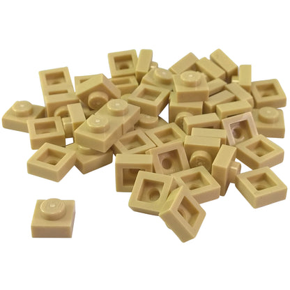 LEGO® Placa 1x1 en color arena, un elemento básico versátil ideal para detalles, separación y conexiones precisas de MOC.
