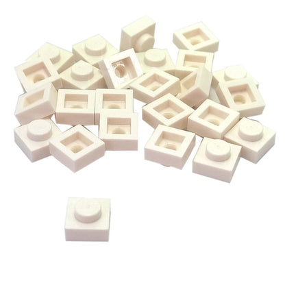 LEGO® Placa 1x1 en blanco, un elemento básico versátil ideal para detalles, espaciado y conexiones precisas de MOC.
